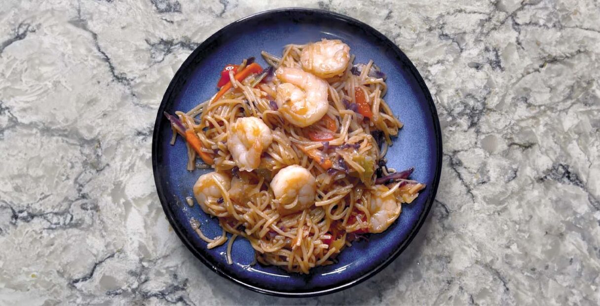 Shrimp Lo-mein on a blue plate