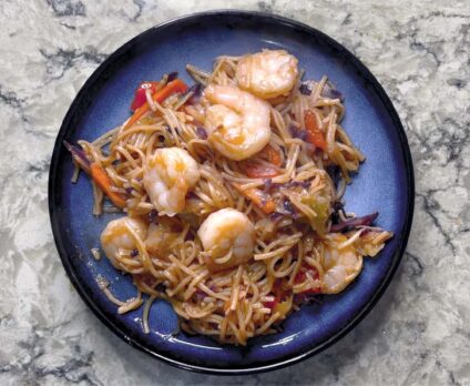 Shrimp Lo-mein on a blue plate